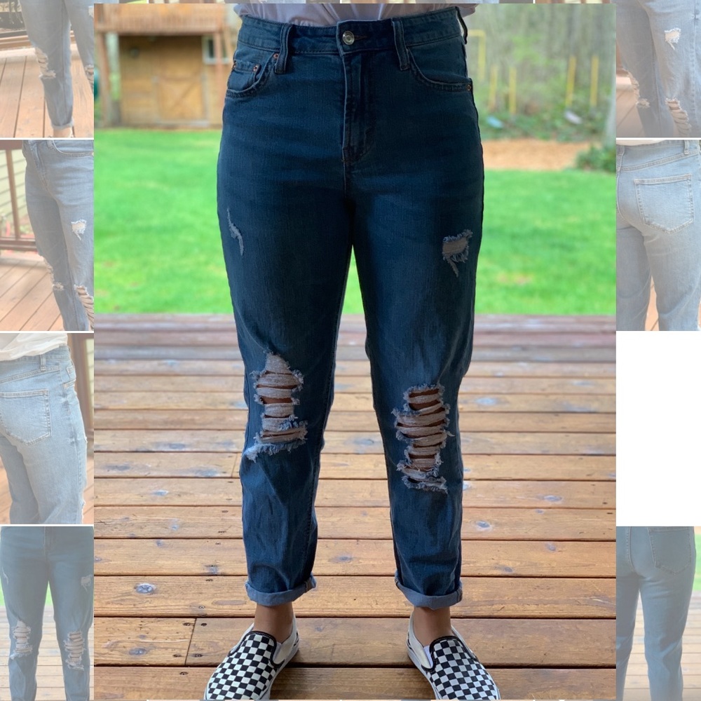 Dark wash distressed blue jeans